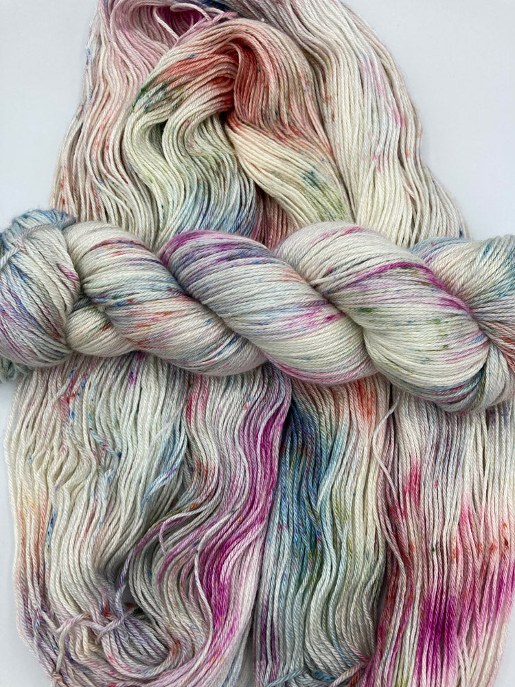 Twisted hank of Bouquet silk blend yarn by Red Door Fibers (variegated)