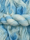 Twisted hank of Dorothy silk blend yarn by Red Door Fibers (variegated)