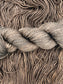 Twisted hank of Kodiak silk blend yarn by Red Door Fibers (solid)