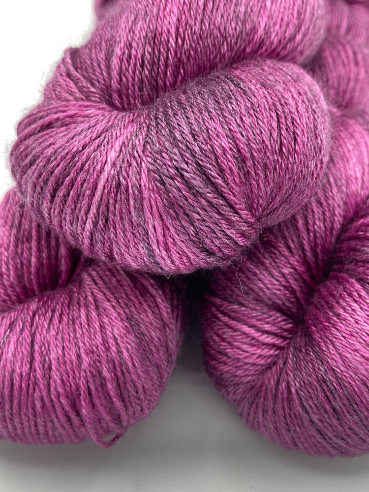Three twisted hanks of Mulberry silk blend yarn by Red Door Fibers (tonal)