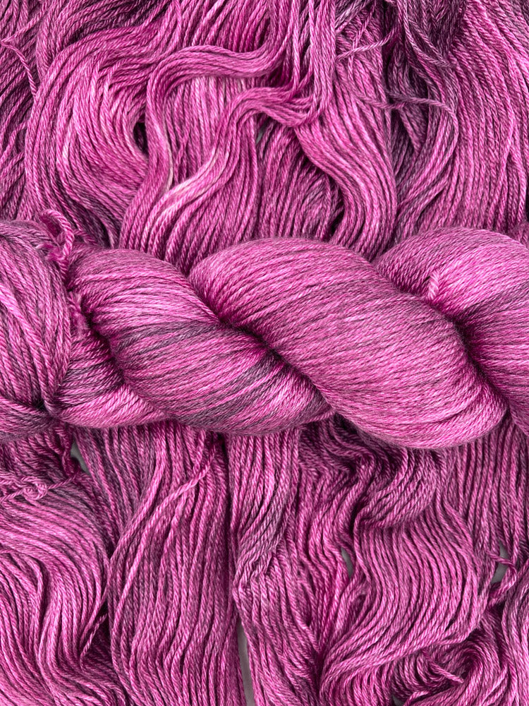 Twisted hank of Mulberry silk blend yarn by Red Door Fibers (tonal)