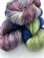 Three twisted hanks of Mystic Queen silk blend yarn by Red Door Fibers (variegated)