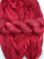 Twisted hank of Ruby Slippers silk blend yarn by Red Door Fibers (tonal)